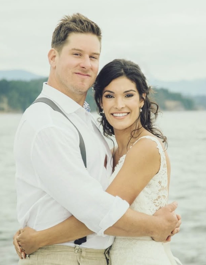 Bride and groom lakeside